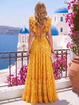 Robestyle robe longue fleurie dos nu lacé avec volants et découpes taille style bohème chic pour été et mariage